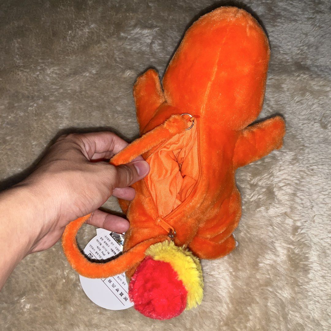 Licensed Pokémon Charmander Pouch Plush Toys (Category: Plushies & Soft Toys) located in San Fernando. Submitted by jz_ofiaza (Listing ID 1469279093, Image 3). Description: Brand New condition .