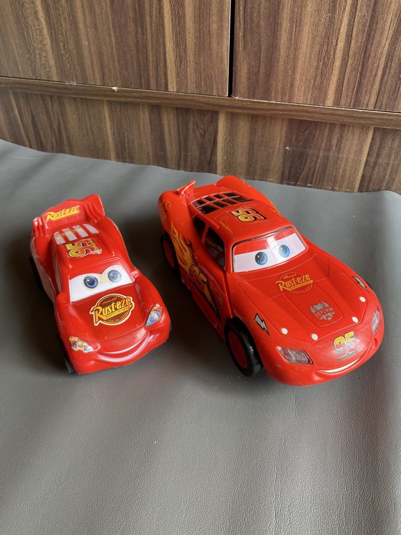 Lightning McQueen Transformers Cars 95 Toy (Category: Vehicle & Diecast Models) located in Manila. Submitted by declutterthingzzz (Listing ID 1469317979, Image 1). Description: - Lightning McQueen toy cars from Cars - 1 version transforms into a fun robot - Features iconic Number 95 decals and Rust-eze branding - Detailed plastic construction with standard wheels - Shows some minor wear from play - Great gift for kids and movie fans Plastic LM no