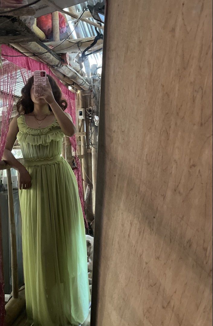 Lime green maxi dress with ruffles (Category: Dresses) located in Caloocan City. Submitted by jai_jai00 (Listing ID 1469233349, Image 3). Description: - Color: Lime Green - Material: Sheer, lightweight fabric - Design: Ruffles on neckline and straps with a flowy maxi skirt - Fit: Stretchy, comfortable smocked elastic waist - Occasion: Ideal for warm weather, parties, and casual events - Condition: Great fit and very comfortable to wear.