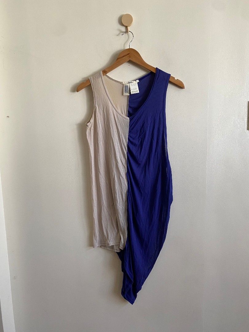 Limi Feu S/S 2011 - Asymmetrical Two Tone Top (Category: Others Tops) located in Abucay. Submitted by jamesnike21 (Listing ID 1469233301, Image 1). Description: 📌Limi feu by Yohji Yamamoto 📌size small on tag 📌length 36' 📌issue : pinhole, washable stain..see pics 📌Slightly wrinkled due to storage 👍 📌The color of the product may differ from actual color depending on the type, condition of the display, surrounding light and other factors. 👍 
