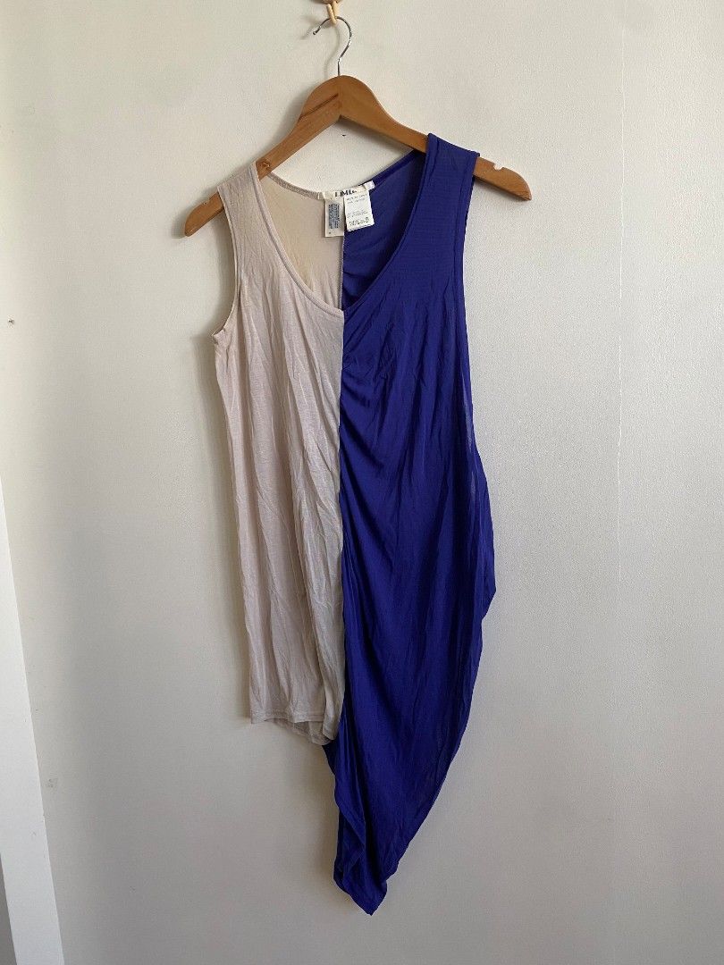Limi Feu S/S 2011 - Asymmetrical Two Tone Top (Category: Others Tops) located in Abucay. Submitted by jamesnike21 (Listing ID 1469233301, Image 2). Description: 📌Limi feu by Yohji Yamamoto 📌size small on tag 📌length 36' 📌issue : pinhole, washable stain..see pics 📌Slightly wrinkled due to storage 👍 📌The color of the product may differ from actual color depending on the type, condition of the display, surrounding light and other factors. 👍 