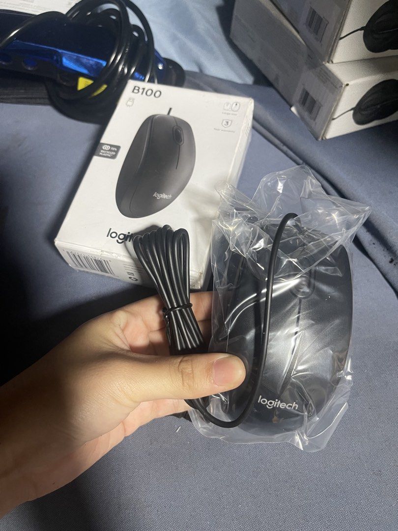 Logitech B100 Corded Mouse (Category: Mouse & Mousepads) located in Paranaque City. Submitted by cesss_la (Listing ID 1469204777, Image 2). Description: - Brand new and sealed in box - Reliable USB corded connection - Comfortable ambidextrous shape for left and right-handed users - Smooth optical tracking - Universal compatibility with Windows, Mac, and Chromebook - Sleek black color.