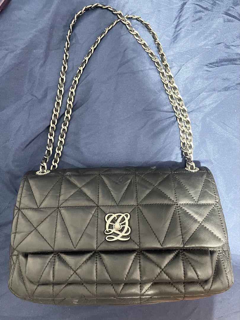 Loius Quatorze Quilted Black Leather Shoulder Bag (Category: Luxury Bags & Wallets) located in Manila. Submitted by abeline07 (Listing ID 1469296483, Image 1). Description: Black quilted leather shoulder bag . Unique triangular geometric stitching pattern across the body. Silver tone chain strap intertwined with black leather. Distinctive silver interlocking anagram turn-lock closure on the front flap. Structured rectangular shape with reinforced