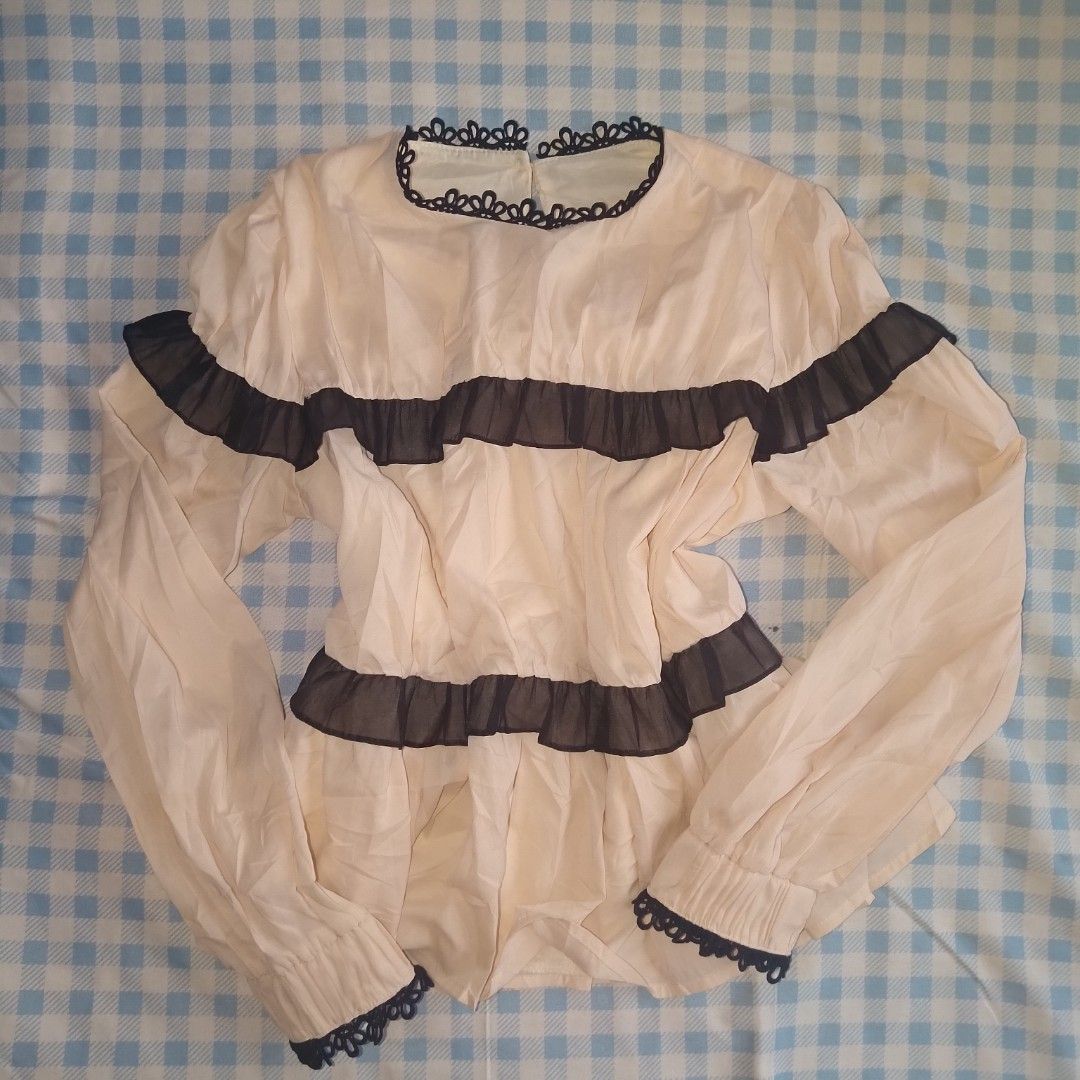 long sleeve tops (Category: Blouses) located in Bacolod City. Submitted by shinonie (Listing ID 1469311897, Image 1). Description: Blouse and Crop top long sleeves get set for 250 Blouse - ₱145 size: M - cute for jirai kei outfits - light cream with black ruffles and end trims - garter on the cuffs Crop top - ₱130 size: M - L - very garterized -white with pink end trims bought but never used.
