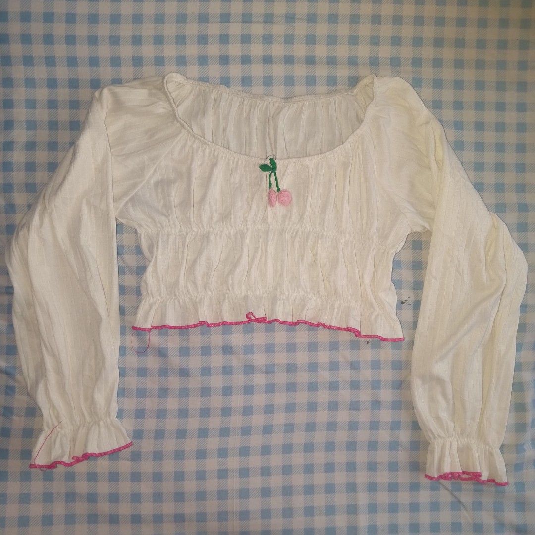 long sleeve tops (Category: Blouses) located in Bacolod City. Submitted by shinonie (Listing ID 1469311897, Image 2). Description: Blouse and Crop top long sleeves get set for 250 Blouse - ₱145 size: M - cute for jirai kei outfits - light cream with black ruffles and end trims - garter on the cuffs Crop top - ₱130 size: M - L - very garterized -white with pink end trims bought but never used.