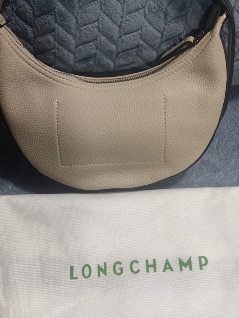 Longchamp Crescent Leather Shoulder Bag (Category: Luxury Bags & Wallets) located in Cainta. Submitted by kluxurychoices (Listing ID 1469233425, Image 2). Description: Longchamp Bag U.S bought very nice in actual .