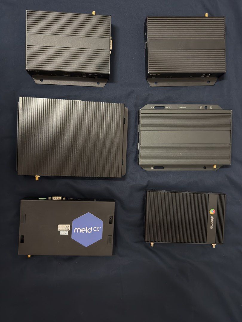 [LOT OF 6] Digital Signage Media Players / Mini PCs (AOPEN, IAdea, meldCX) (Category: Other Accessories) located in Singapore. Submitted by zerojunksg (Listing ID 1469310783, Image 2). Description: What’s Included in the Bundle (6 Units Total): 1. 3x IAdea Digital Signage Media Appliances (Model: XMP-6400) HD 1080p commercial media players with HDMI output, RS232, and Ethernet. 2. 1x AOPEN Chromebox Mini Commercial (Model: ME4100) Fanless commerc