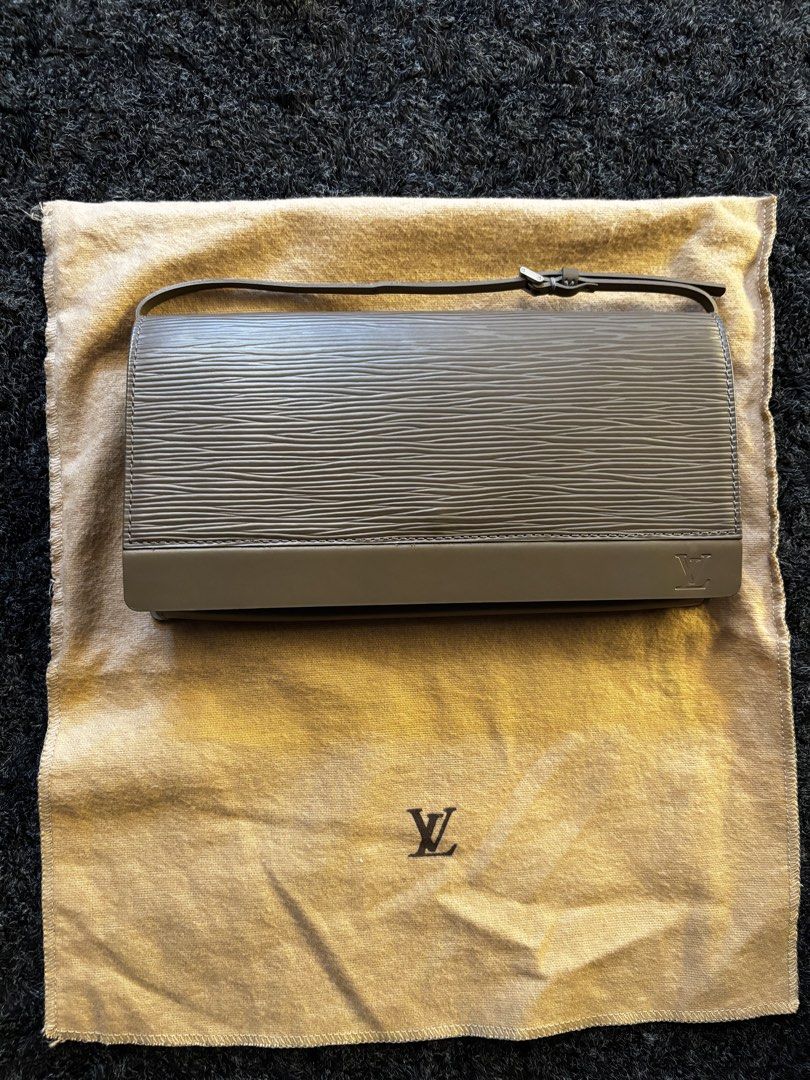 Louis Vuitton Epi Bag (Category: Luxury Bags & Wallets) located in Pasay City. Submitted by N30G0TMYBAEK (Listing ID 1469271875, Image 1). Description: - Authentic Louis Vuitton bag in Epi leather - Signature LV logo stamped on the front lower corner - Secure flap closure with snap button - Slim, adjustable strap for comfortable wear - Functional interior with built-in card slots - Pristine, clean interior with protective paper still inside - Com