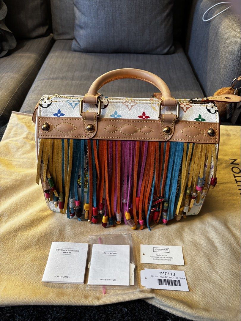 Louis Vuitton Fringe Speedy 25 (Category: Luxury Bags & Wallets) located in Pasay City. Submitted by N30G0TMYBAEK (Listing ID 1469273413, Image 2). Description: Louis Vuitton White Monogram Multicolore Fringe Speedy 25 Limited edition collab with Takashi Murakami released in 2006 selling for about $5,200 (₱328k) in great condition. with dust bag and tags .