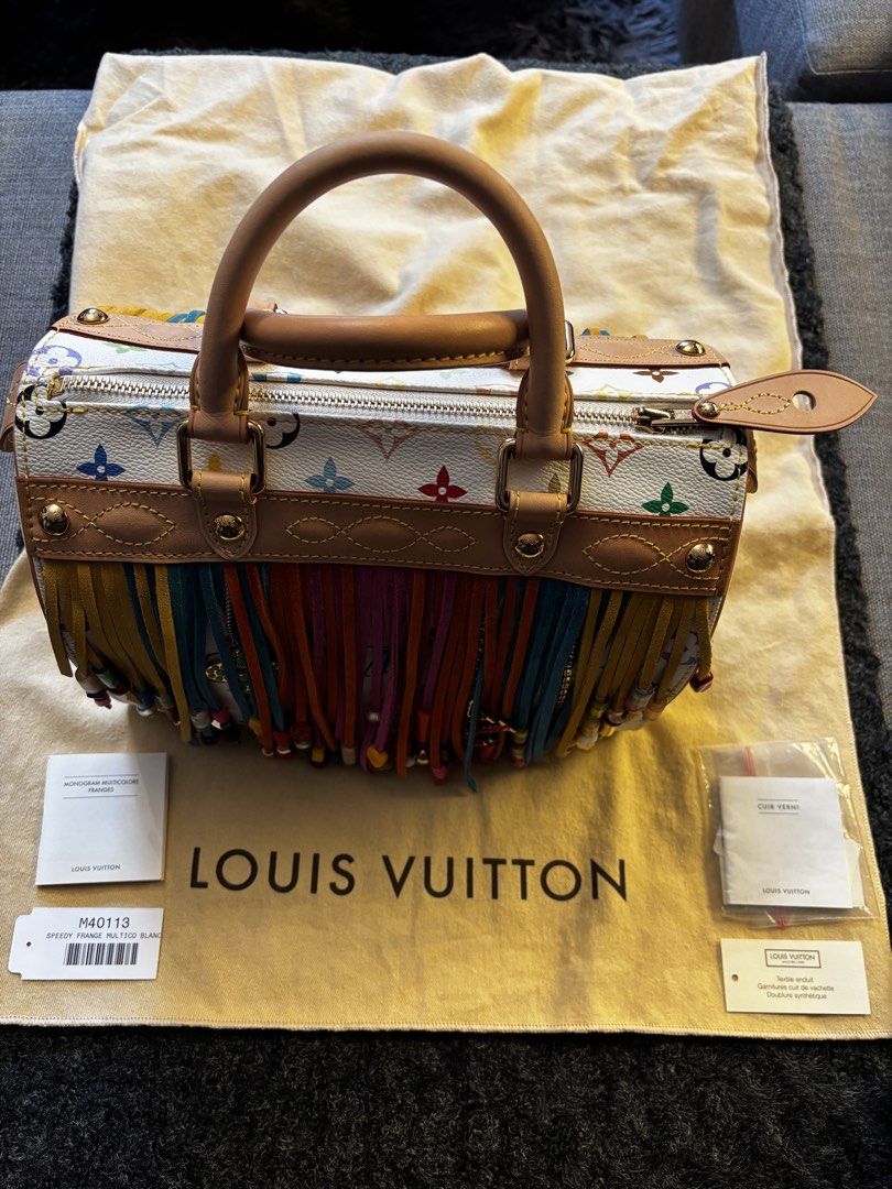 Louis Vuitton Fringe Speedy 25 (Category: Luxury Bags & Wallets) located in Pasay City. Submitted by N30G0TMYBAEK (Listing ID 1469273413, Image 1). Description: Louis Vuitton White Monogram Multicolore Fringe Speedy 25 Limited edition collab with Takashi Murakami released in 2006 selling for about $5,200 (₱328k) in great condition. with dust bag and tags .