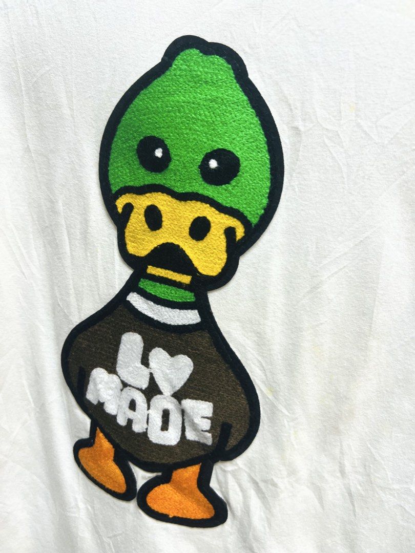 Louis Vuitton LV Made Duck Patch White T-shirt (Category: Luxury Apparel) located in Manila. Submitted by irenekaren57943 (Listing ID 1469171245, Image 3). Description: 𒊹︎ Louis Vuitton LV Made Duck White T-Shirt ➤ 𝟐𝟏 𝐖 | 𝟐𝟗 𝐋 (𝐌-𝐋) ➤ 𝐋𝐢𝐤𝐞 𝐍𝐞𝐰 ➤ 𝐂𝐮𝐭 𝐓𝐚𝐠𝐬 .