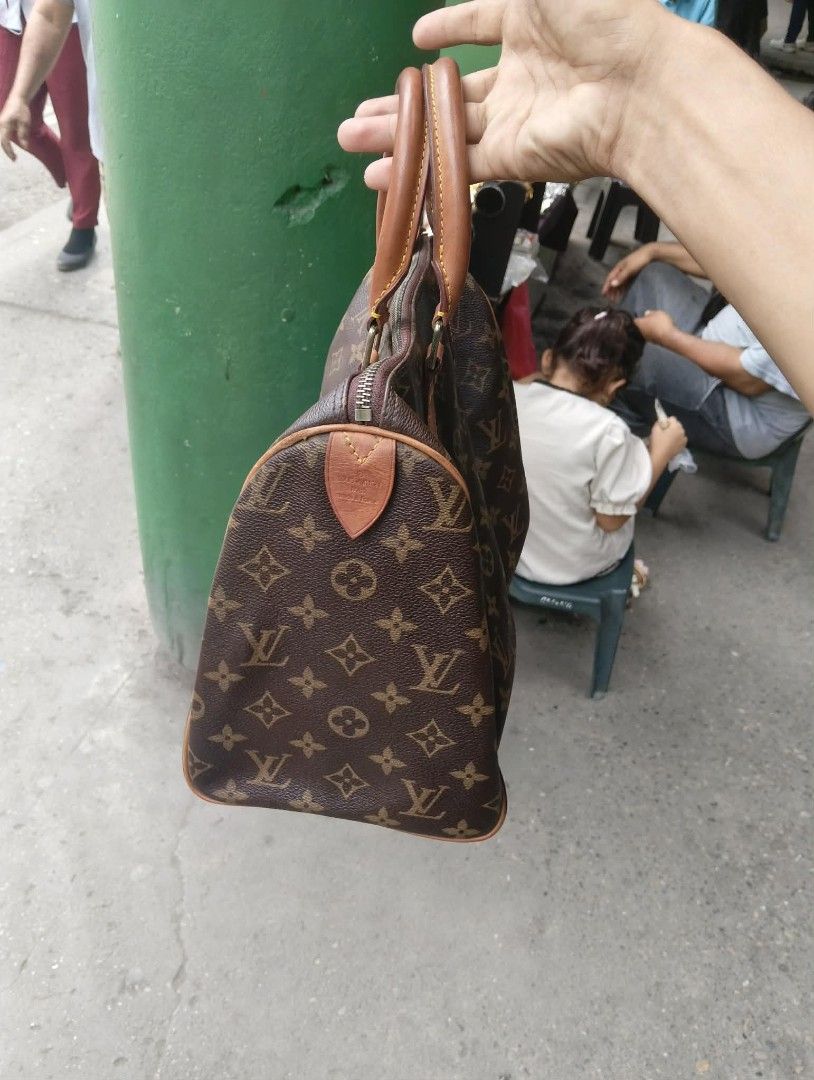 Louis Vuitton Monogram Canvas Speedy Handbag (Category: Luxury Bags & Wallets) located in Zamboanga. Submitted by nurjim_hajim (Listing ID 1469212401, Image 3). Description: - Authentic Louis Vuitton Monogram Canvas Handbag - Classic brown and tan colorway with a chic, structured shape - Features durable Vachetta leather top handles and trim - Secure zip-top closure to keep your daily essentials safe - Roomy interior fits phone, wallet, keys, and