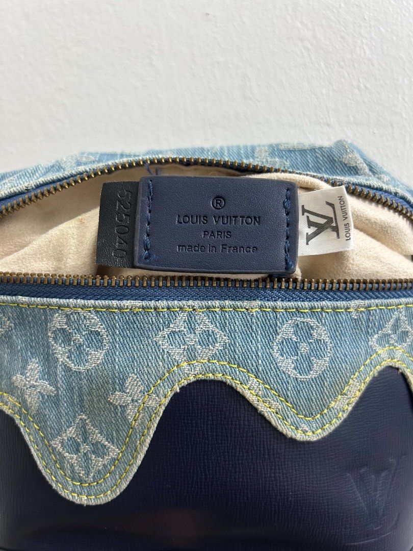 Louis Vuitton Monogram Denim and Leather Handbag (Category: Luxury Bags & Wallets) located in Manila. Submitted by yummy245 (Listing ID 1469201135, Image 2). Description: - Brand: Louis Vuitton - Material: Blue monogram denim and dark leather with scalloped trim - Hardware: Gold-tone - Closure: Front zipper - Handles: Knotted top handle and detachable black shoulder strap - Interior: Light fabric lining with LV Paris made in France leather tag - 