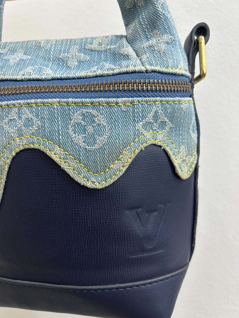 Louis Vuitton Monogram Denim and Leather Handbag (Category: Luxury Bags & Wallets) located in Manila. Submitted by yummy245 (Listing ID 1469201135, Image 3). Description: - Brand: Louis Vuitton - Material: Blue monogram denim and dark leather with scalloped trim - Hardware: Gold-tone - Closure: Front zipper - Handles: Knotted top handle and detachable black shoulder strap - Interior: Light fabric lining with LV Paris made in France leather tag - 