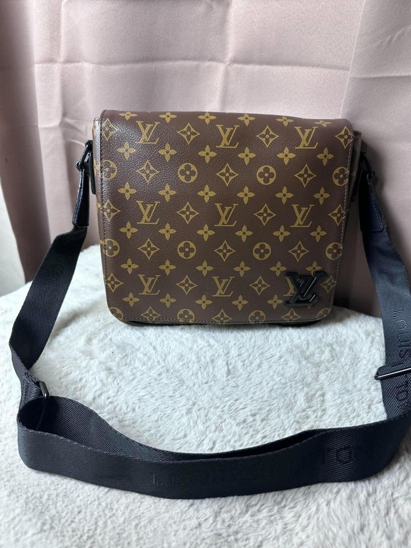 Louis Vuitton Monogram Messenger Bag (Category: Luxury Bags & Wallets) located in Davao. Submitted by luckyturtle.aa6ccf (Listing ID 1469273614, Image 3). Description: - Authentic Louis Vuitton monogram coated canvas messenger bag - Sleek black adjustable shoulder strap with woven logo lettering - Secure front flap closure featuring a dark hardware LV logo accent - Structured sides and bottom base for durability - Roomy everyday crossbody style, 