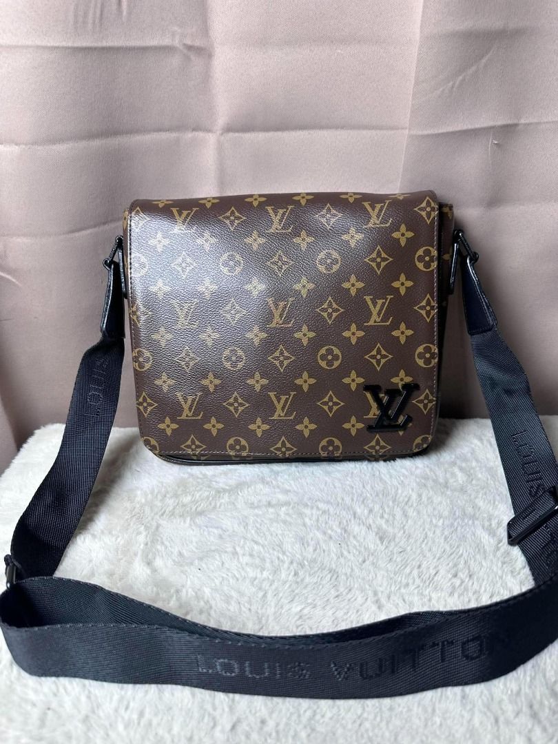 Louis Vuitton Monogram Messenger Bag (Category: Luxury Bags & Wallets) located in Davao. Submitted by luckyturtle.aa6ccf (Listing ID 1469273614, Image 1). Description: - Authentic Louis Vuitton monogram coated canvas messenger bag - Sleek black adjustable shoulder strap with woven logo lettering - Secure front flap closure featuring a dark hardware LV logo accent - Structured sides and bottom base for durability - Roomy everyday crossbody style, 