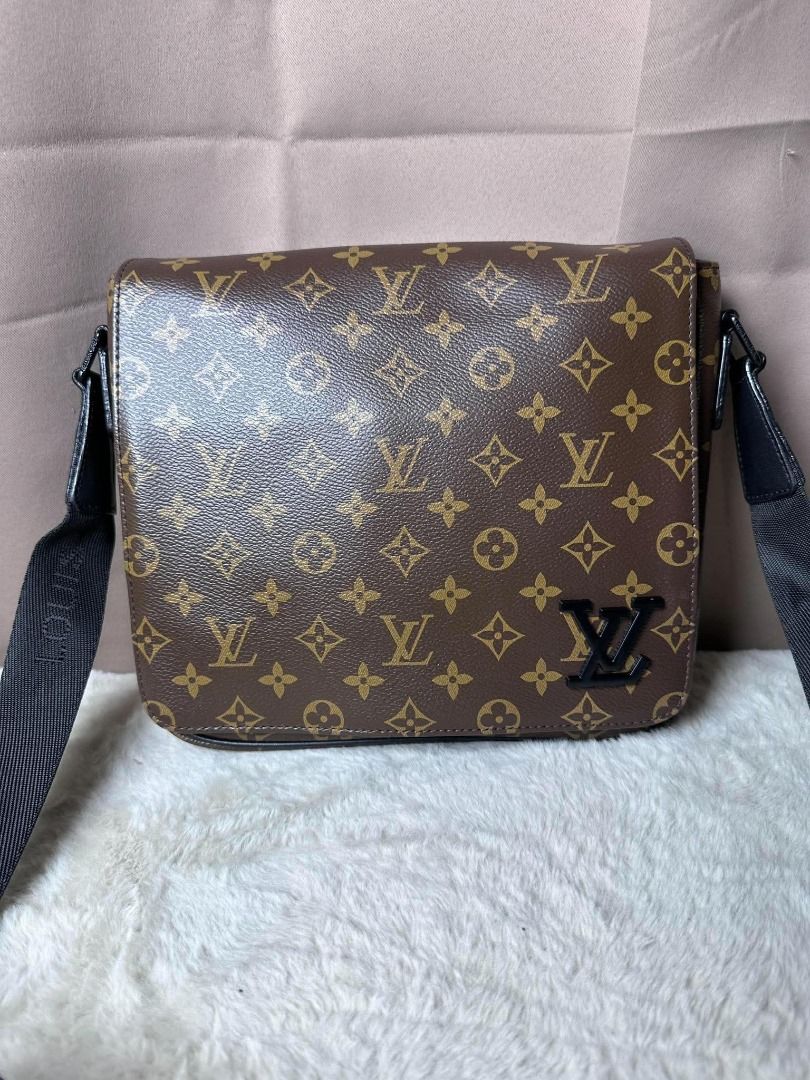 Louis Vuitton Monogram Messenger Bag (Category: Luxury Bags & Wallets) located in Davao. Submitted by luckyturtle.aa6ccf (Listing ID 1469273614, Image 2). Description: - Authentic Louis Vuitton monogram coated canvas messenger bag - Sleek black adjustable shoulder strap with woven logo lettering - Secure front flap closure featuring a dark hardware LV logo accent - Structured sides and bottom base for durability - Roomy everyday crossbody style, 
