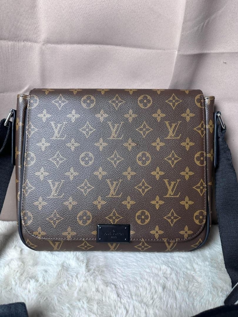 Louis Vuitton Monogram Messenger Bag (Category: Luxury Bags & Wallets) located in Davao. Submitted by luckyturtle.aa6ccf (Listing ID 1469273757, Image 2). Description: - Authentic Louis Vuitton messenger bag - Classic brown monogram canvas with dark hardware - Adjustable black canvas strap for shoulder or crossbody wear - Secure flap closure - Burgundy interior lining with a convenient slip pocket - Stamped Louis Vuitton Paris made in France.