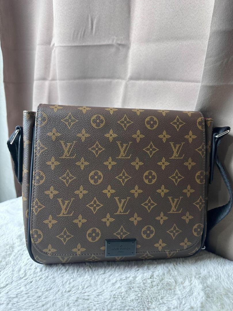 Louis Vuitton Monogram Messenger Bag (Category: Luxury Bags & Wallets) located in Davao. Submitted by luckyturtle.aa6ccf (Listing ID 1469273757, Image 3). Description: - Authentic Louis Vuitton messenger bag - Classic brown monogram canvas with dark hardware - Adjustable black canvas strap for shoulder or crossbody wear - Secure flap closure - Burgundy interior lining with a convenient slip pocket - Stamped Louis Vuitton Paris made in France.