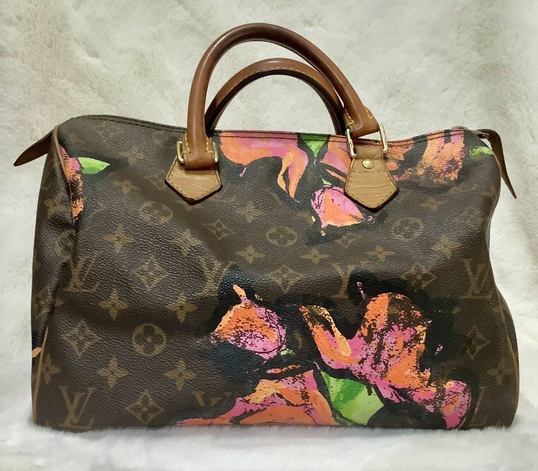 Louis Vuitton Monogram Rose Speedy Bag (Category: Luxury Bags & Wallets) located in Quezon City. Submitted by heybailey (Listing ID 1469209640, Image 1). Description: - Brand: Louis Vuitton - Design: Iconic Monogram canvas with limited-edition vibrant printed roses - Style: Classic Speedy silhouette with dual rolled leather handles and top zip closure - Details: Premium brown leather trim and polished gold-tone hardware - Interior: Spacious main 