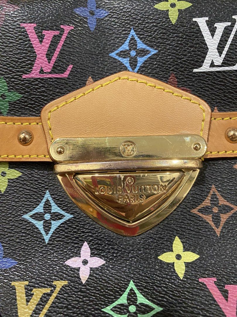 Louis Vuitton Multicolore Black Handbag (Category: Luxury Bags & Wallets) located in Muntinlupa City. Submitted by mj.finds (Listing ID 1469257057, Image 2). Description: - Brand: Louis Vuitton - Material: Black Multicolore Monogram Canvas with Vachetta leather trim - Hardware: Gold-tone with engraved branding and brass studs - Closure: Secure front clasp closure - Handles: Double top handles for easy carrying - Interior: Grey lining with stamped