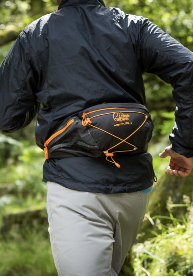 Lowe Alpine Lightflite 5 Waist Pack (Category: Belt bags, Clutches and Pouches) located in Cagayan de Oro. Submitted by aljay02 (Listing ID 1469295827, Image 1). Description: - Brand/Model: Lowe Alpine Lightflite 5 waist pack - Color: Black and Orange - Ideal for: Running, hiking, and outdoor workouts - Features: Front bungee cord system for extra gear, secure mesh side pockets for bottles - Fit: Adjustable waist strap with sturdy buckle closure 