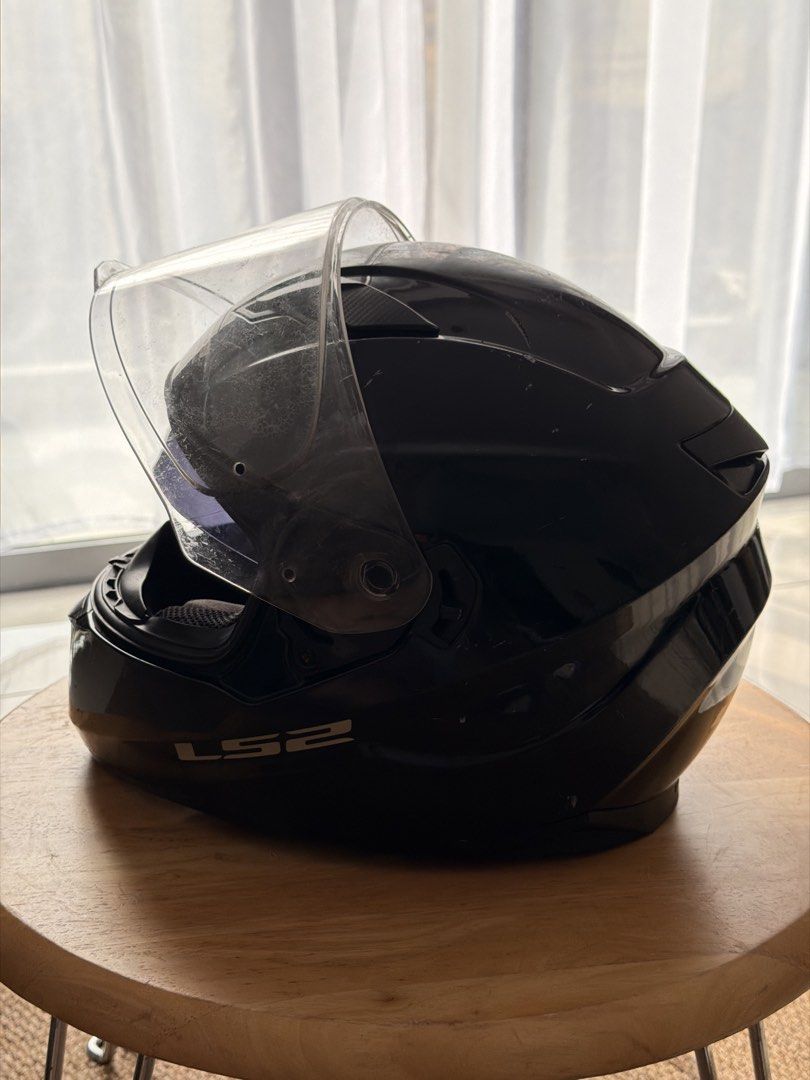 LS2 Stream Evo Helmet Black (Category: Caps & Hats) located in Manila. Submitted by biliberjes42462 (Listing ID 1469222859, Image 3). Description: - Model: LS2 Stream Evo Motorcycle Helmet - Color: Black - Safety: ECE R22-05 certified - Visor: Clear outer visor plus built-in drop-down sun visor Issue: Drop-down sun visor a bit loose.