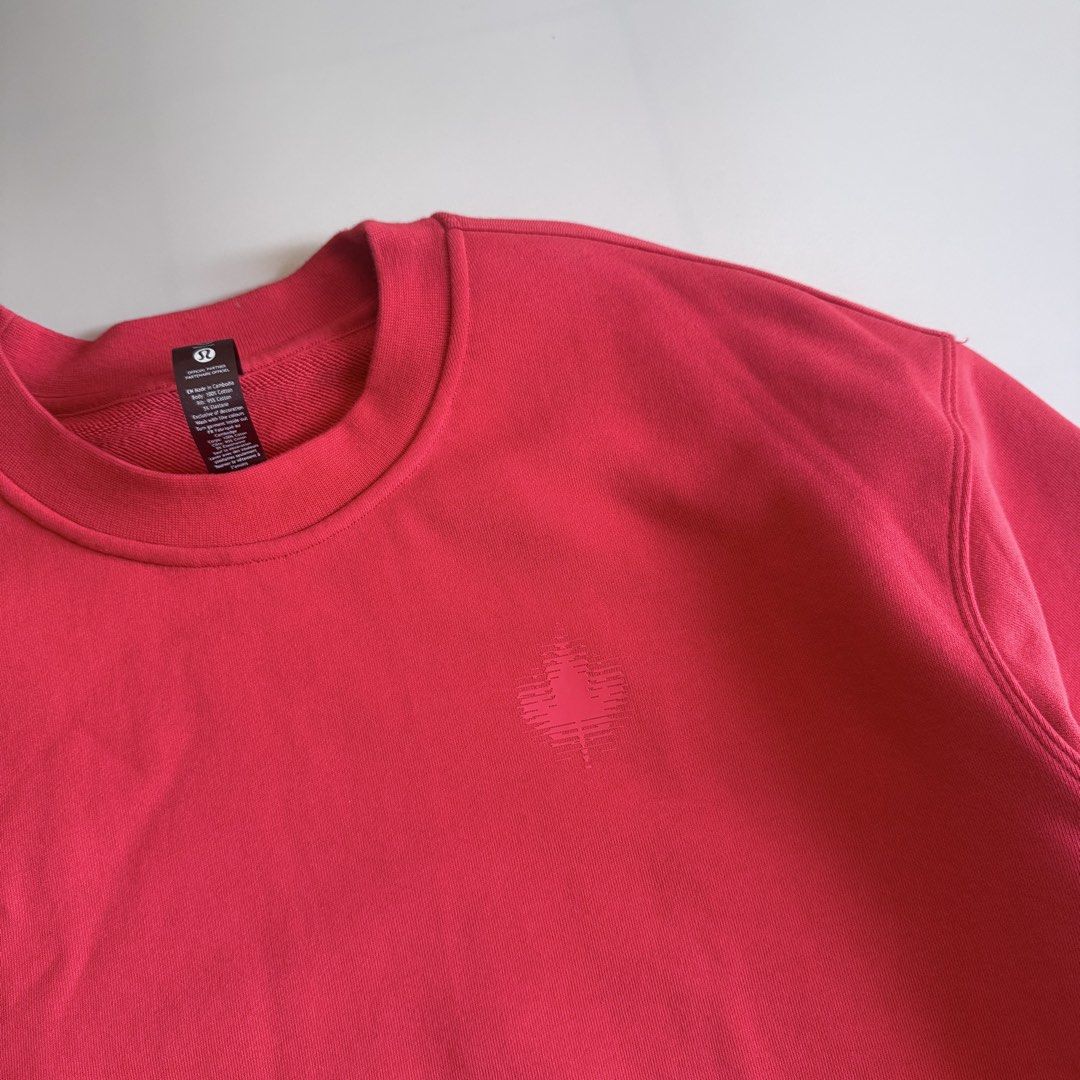 Lululemon Canada Olympic Sweatshirt Red (Category: Coats, Jackets and Outerwear) located in Benito Soliven. Submitted by markedasdifferent (Listing ID 1469249868, Image 3). Description: - Brand: Lululemon (Official Team Canada Merchandise) - Style: Crewneck sweatshirt with heavyweight fleece interior - Color: Bright Red - Size: 2 - Material: 100% cotton body with elastane ribbing for comfort - Details: Subtle chest maple leaf logo, large distorte