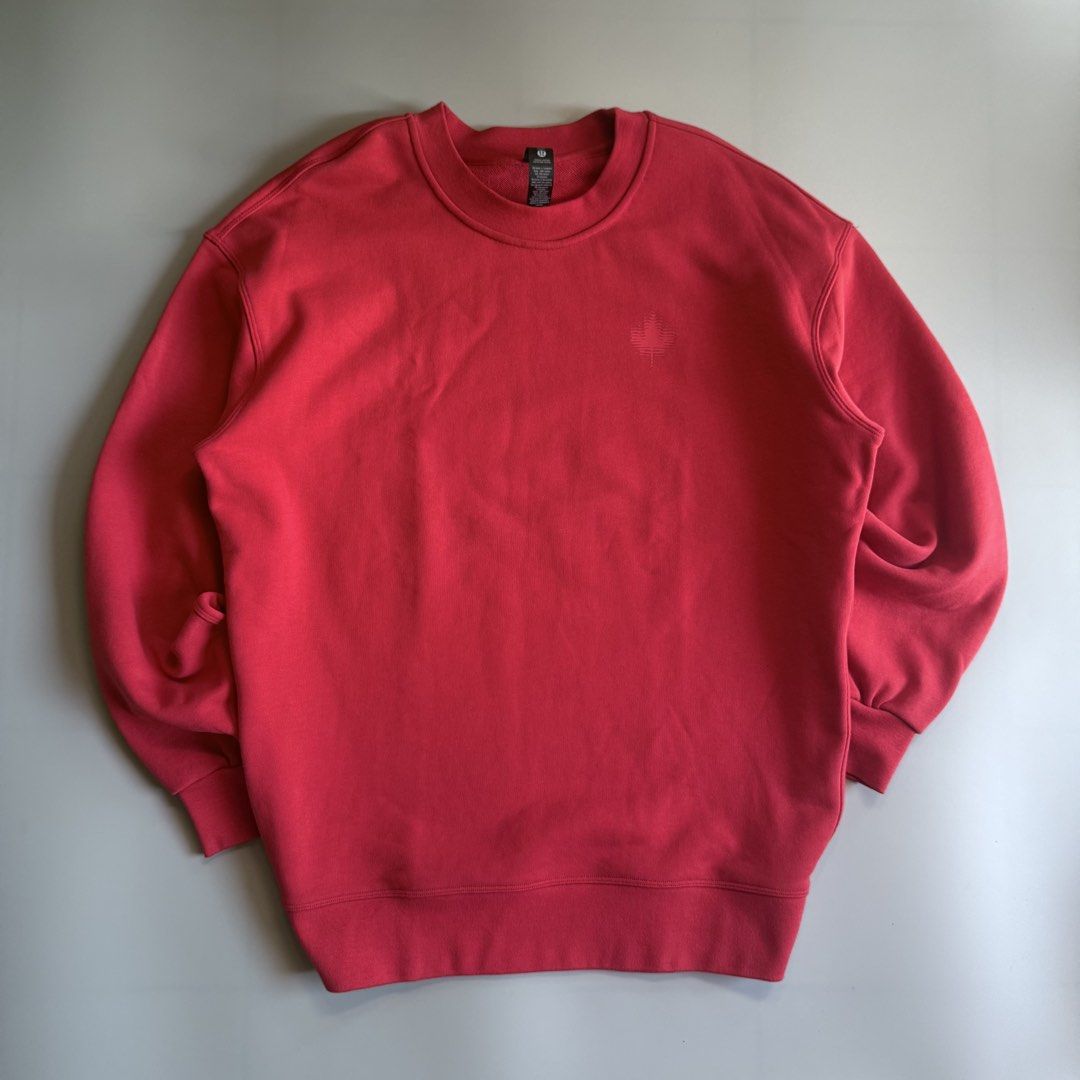 Lululemon Canada Olympic Sweatshirt Red (Category: Coats, Jackets and Outerwear) located in Benito Soliven. Submitted by markedasdifferent (Listing ID 1469249868, Image 1). Description: - Brand: Lululemon (Official Team Canada Merchandise) - Style: Crewneck sweatshirt with heavyweight fleece interior - Color: Bright Red - Size: 2 - Material: 100% cotton body with elastane ribbing for comfort - Details: Subtle chest maple leaf logo, large distorte