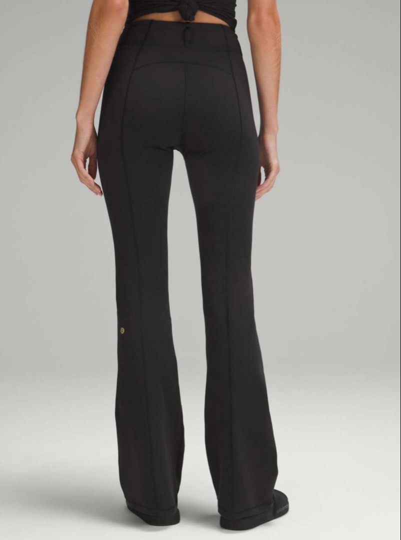 Lululemon Define Zip-Front High-Rise Flared Pants (Category: Activewear) located in Bacolod City. Submitted by angeliqueyusay (Listing ID 1469192510, Image 3). Description: - Brand: Lululemon - Color: Black - Style: High-rise flare pants with front zipper closure - Details: Structured seam lines on front and back legs, subtle back logo - Fabric: Smooth, high-stretch, comfortable material - Condition: Brand new / Excellent quality - Mode of Paymen