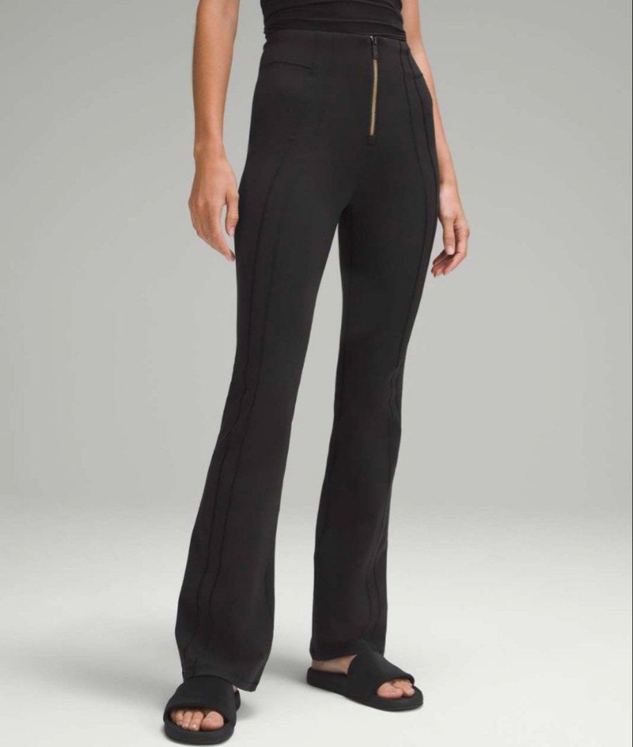 Lululemon Define Zip-Front High-Rise Flared Pants (Category: Activewear) located in Bacolod City. Submitted by angeliqueyusay (Listing ID 1469192510, Image 2). Description: - Brand: Lululemon - Color: Black - Style: High-rise flare pants with front zipper closure - Details: Structured seam lines on front and back legs, subtle back logo - Fabric: Smooth, high-stretch, comfortable material - Condition: Brand new / Excellent quality - Mode of Paymen