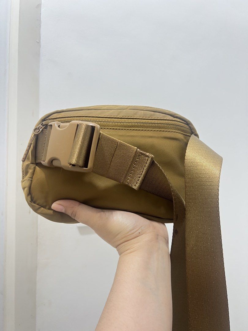 Lululemon Everywhere Belt Bag Brown (Category: Belt bags, Clutches and Pouches) located in Antipolo. Submitted by luxurieslvoes (Listing ID 1469201541, Image 2). Description: - Authentic Lululemon belt bag in a versatile brown color - Durable water-repellent fabric protects your items during commutes, workouts, or errands - Adjustable strap allows for comfortable waist or cross-body wear - Secure zippered main compartment keeps your phone, keys, 