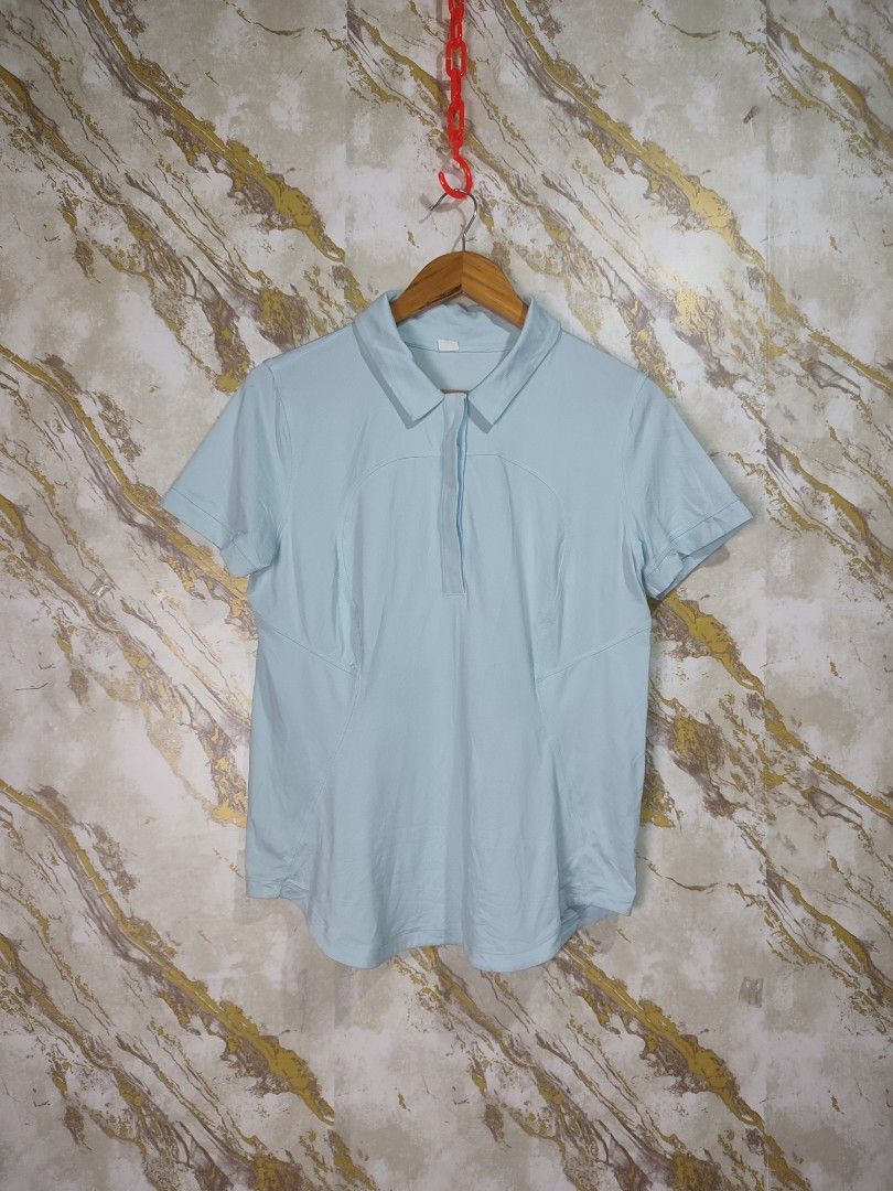 Lululemon Light Blue Polo Shirt (Category: Activewear) located in Cabuyao City. Submitted by jederama (Listing ID 1469199651, Image 2). Description: LULULEMON - DRIFIT STRETCH POLO ( WOMENS ) SIZE : 10 ON TAG ( MEDIUM TO LARGE ) WIDTH - 18 LENGTH - 24 GOOD AS NEW CONDITION NO ISSUE / NO FLAWS AUTHENTIC 💯 900 + SHIPPING FEE.