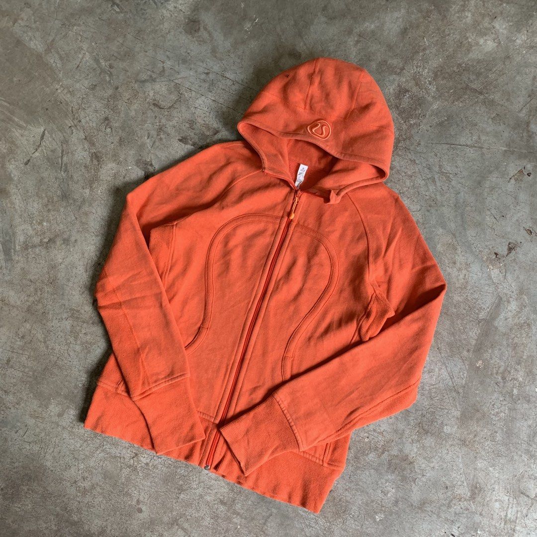 Lululemon Orange Full Zip Hoodie Size 10 (Category: Coats, Jackets and Outerwear) located in Manila. Submitted by emplysthrift. (Listing ID 1469224931, Image 2). Description: Lululemon Orange Full Zip Hoodie Size 10 Width "19.9 Length "26 Excellent Condition Colorrate: 9.5/10 Flaws: none Unli vouch/vc for safe transactions 📲 Location: Laspinas City, Metro Manila, Brngy Talon Uno. 📍 DM IF INTERESTED📥 - Brand: Lululemon - Style: Classic Scuba Fu