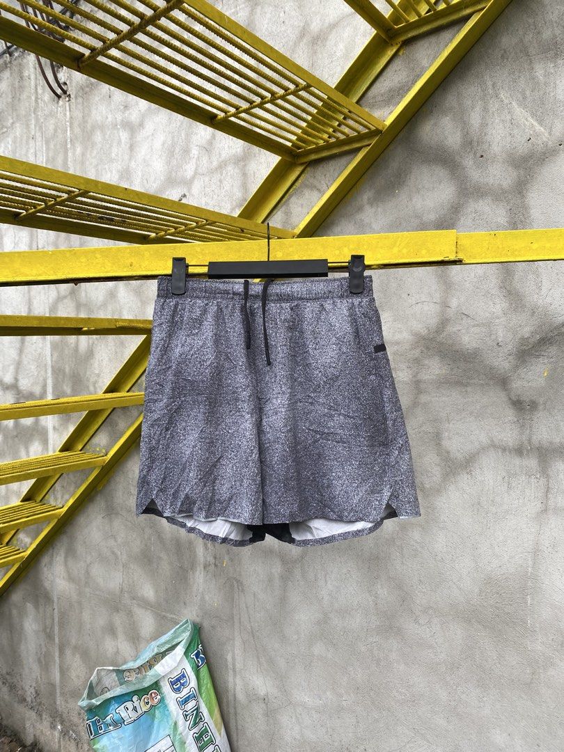 Lululemon Running Short (Category: Shorts) located in Lucena. Submitted by handpickthrift (Listing ID 1469285673, Image 2). Description: - Brand: Lululemon Size 28-32 Above the knee - Color: Heathered Grey - Condition: Excellent - Built-in liner for extra comfort and support - Adjustable drawstring waist for a secure fit - Convenient back zipper pocket for small essentials - Reflective logo near the hem for low-light visibility - Lightweight, str