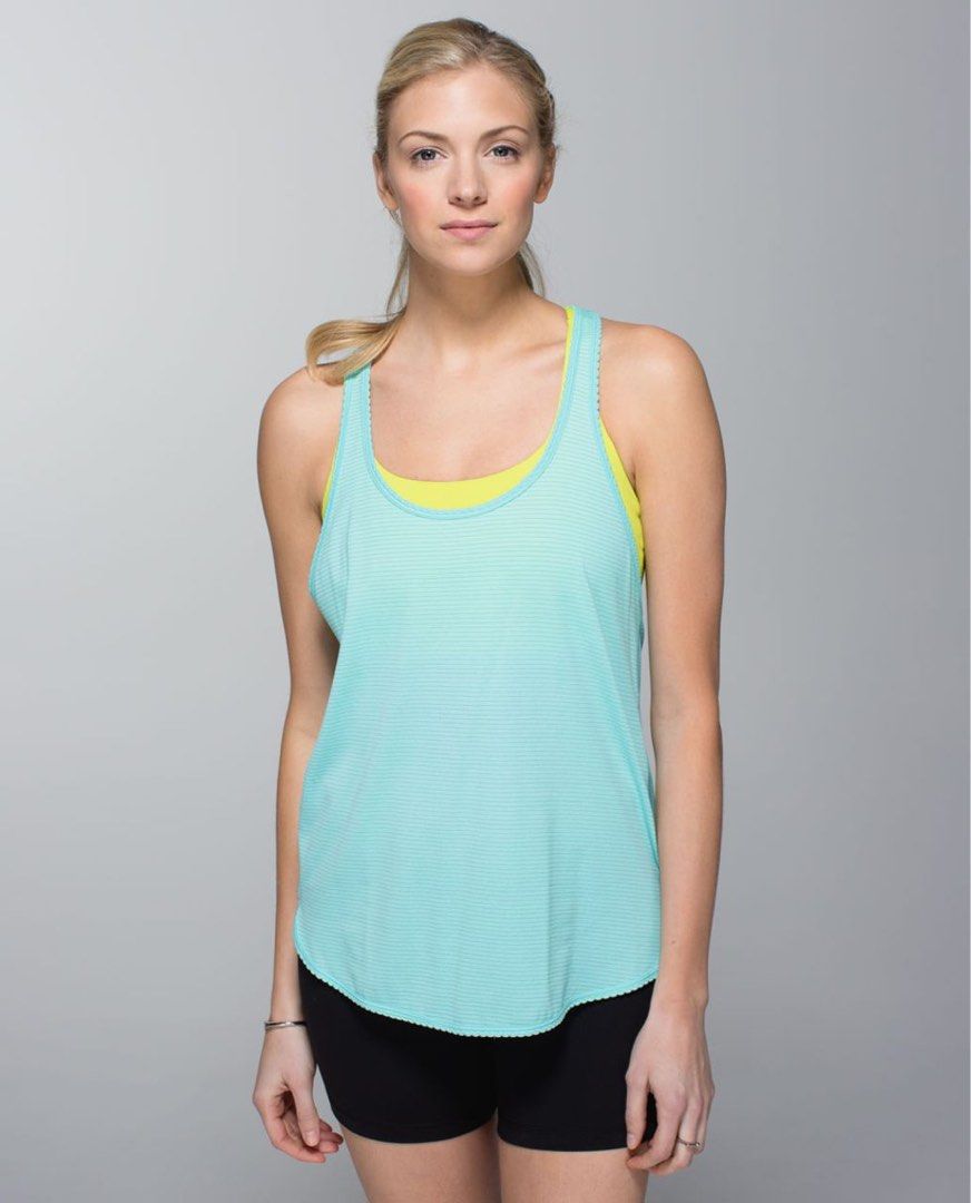 Lululemon Striped Athletic Tank Top (Category: Activewear) located in Ajuy. Submitted by galitsabarat (Listing ID 1469292882, Image 3). Description: - Brand: Lululemon - Design: Light blue & white stripes with a racerback and rounded hem - Material: Lightweight & breathable fabric, ideal for workouts or casual days - Details: Contrast stitching & iconic silver omega logo on the back - Mode of Payment: GCash, BPI, or COD - Shipping: Via J&T or Sam