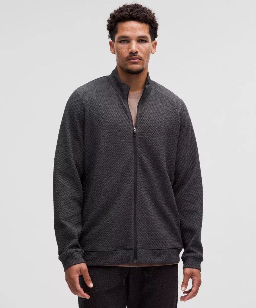 Lululemon Textured Double-Knit Cotton Zip-Up Jacket (Category: Activewear) located in Manila. Submitted by limsanity03 (Listing ID 1469298584, Image 1). Description: - Brand: Lululemon - Style: Full-zip fleece jacket with high collar - Color: Dark grey textured fabric - Features: Front pockets, signature logo zipper pull, and back hanging loop - Condition: Excellent / Pre-loved (as applicable) - Perfect for: Workouts, chilly days, and casual wear