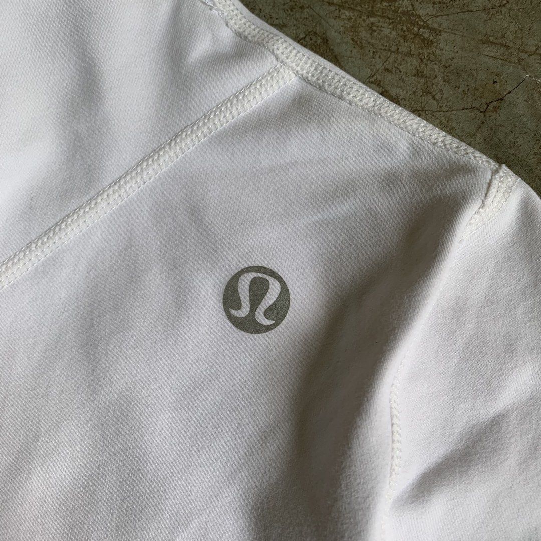 Lululemon White Zip Up Jacket (Category: Coats, Jackets and Outerwear) located in Manila. Submitted by emplysthrift. (Listing ID 1469230594, Image 3). Description: Width "17 Length "23 Good Condition Colorrate: 9/10 Flaws: minor dirtstains Unli vouch/vc for safe transactions 📲 Location: Laspinas City, Metro Manila, Brngy Talon Uno. 📍 DM IF INTERESTED📥 - Brand: Lululemon - Color: White - Style: Athletic zip-up jacket with mock neck and diagonal