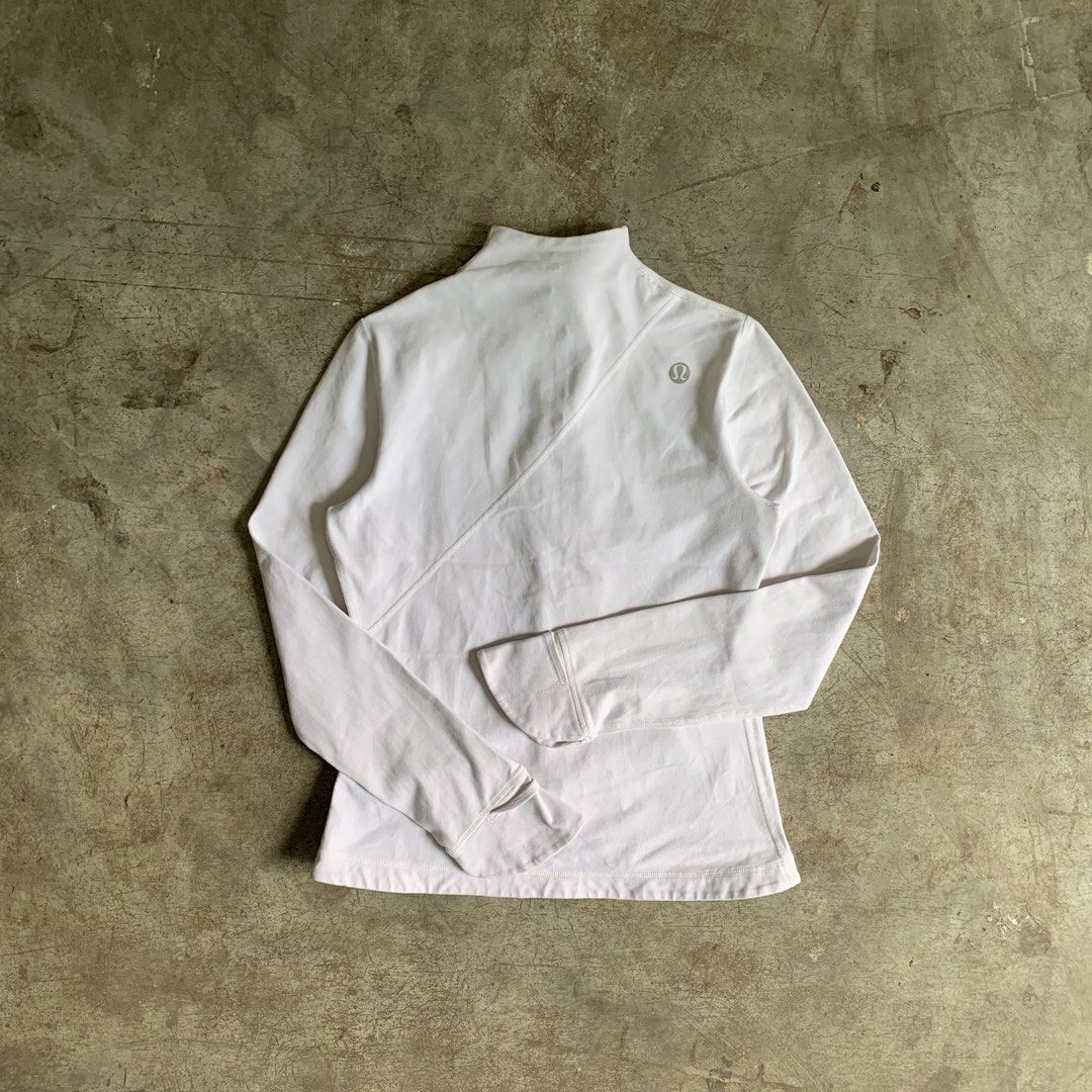 Lululemon White Zip Up Jacket (Category: Coats, Jackets and Outerwear) located in Manila. Submitted by emplysthrift. (Listing ID 1469230594, Image 1). Description: Width "17 Length "23 Good Condition Colorrate: 9/10 Flaws: minor dirtstains Unli vouch/vc for safe transactions 📲 Location: Laspinas City, Metro Manila, Brngy Talon Uno. 📍 DM IF INTERESTED📥 - Brand: Lululemon - Color: White - Style: Athletic zip-up jacket with mock neck and diagonal