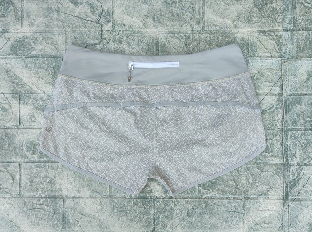 Lululemon Women's Shorts - Dot 6 (Category: Shorts) located in Bayambang. Submitted by mon10192816 (Listing ID 1469263896, Image 1). Description: - Brand: Lululemon - Style: Athletic running/workout shorts - Size: 6 (tag inside back zipper pocket) - Features: Wide waistband, secure rear zip pocket, and gel loops on the back yoke.