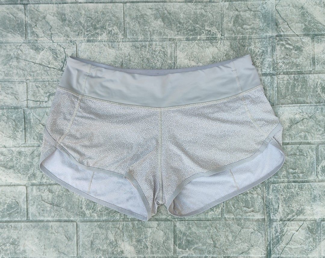 Lululemon Women's Shorts - Dot 6 (Category: Shorts) located in Bayambang. Submitted by mon10192816 (Listing ID 1469263896, Image 2). Description: - Brand: Lululemon - Style: Athletic running/workout shorts - Size: 6 (tag inside back zipper pocket) - Features: Wide waistband, secure rear zip pocket, and gel loops on the back yoke.