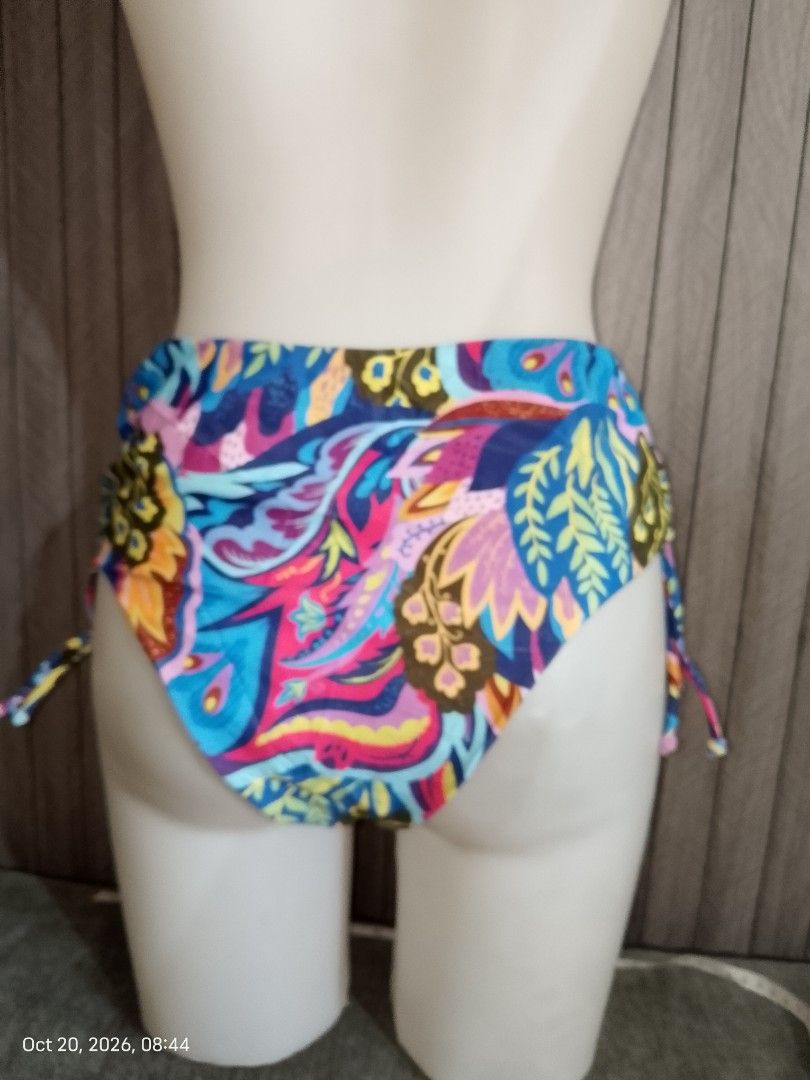 M: multicolored highwaist bikini bottom (Category: Bikinis & Swimsuits) located in Manila. Submitted by truecrystal-1407 (Listing ID 1469165167, Image 2). Description: women's high-waisted bikini bottom featuring a vibrant, multi-colored tropical and floral pattern in shades of blue, pink, and green..