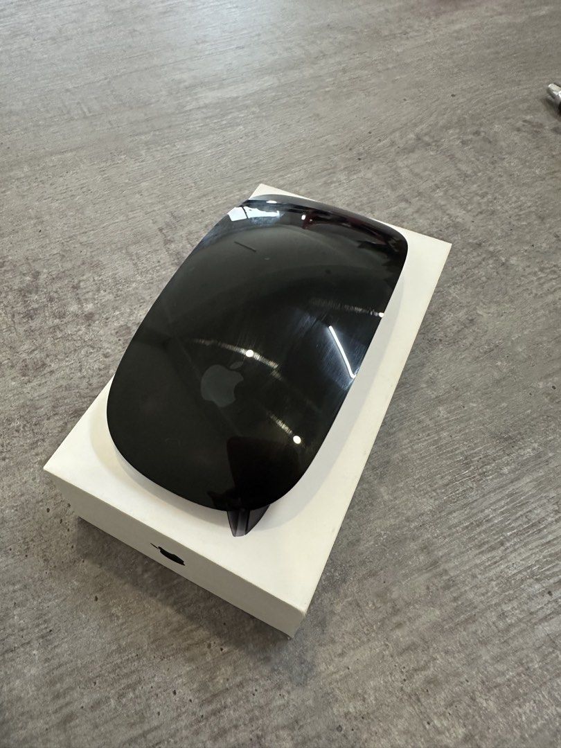 Magic Mouse (Black) (Category: Mouse & Mousepads) located in Cavite. Submitted by gcruz0512 (Listing ID 1469217493, Image 1). Description: Seldom used Rfs: impulse buy. Will stick to a bigger mouse .