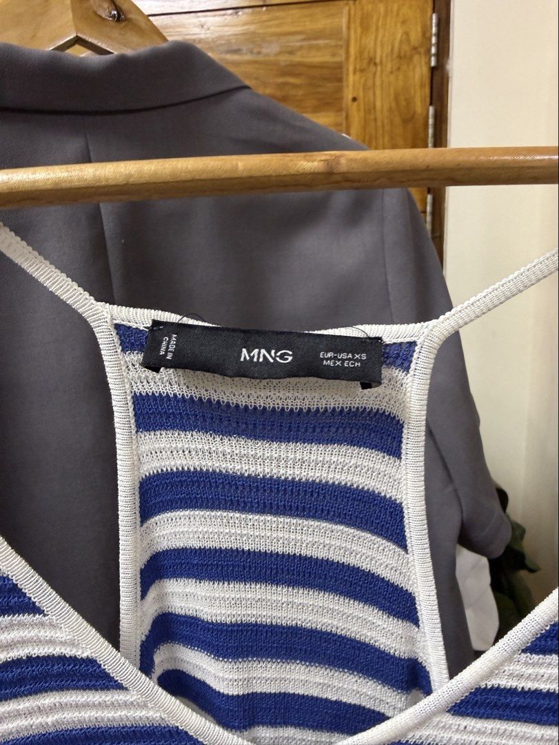 MANGO Blue and White Striped Maxi Dress (Category: Dresses) located in Manila. Submitted by kjscloset_ (Listing ID 1469339968, Image 3). Description: NO LOWBALLING ‼️ Issue: pulled threads on the bottom part of the inner dress. RFS: Decluttering Price is firm Payment first (Gcash only) Mango blue and white striped knitted maxi dress. Thin straps and racerback design. Knit material, lightweight. Size XS(Europe and USA). Has some pulled threads and