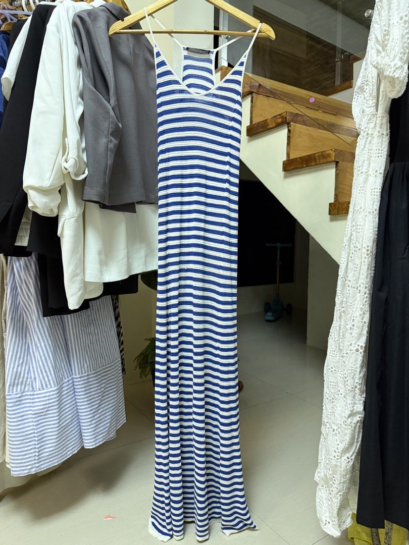 MANGO Blue and White Striped Maxi Dress (Category: Dresses) located in Manila. Submitted by kjscloset_ (Listing ID 1469339968, Image 2). Description: NO LOWBALLING ‼️ Issue: pulled threads on the bottom part of the inner dress. RFS: Decluttering Price is firm Payment first (Gcash only) Mango blue and white striped knitted maxi dress. Thin straps and racerback design. Knit material, lightweight. Size XS(Europe and USA). Has some pulled threads and