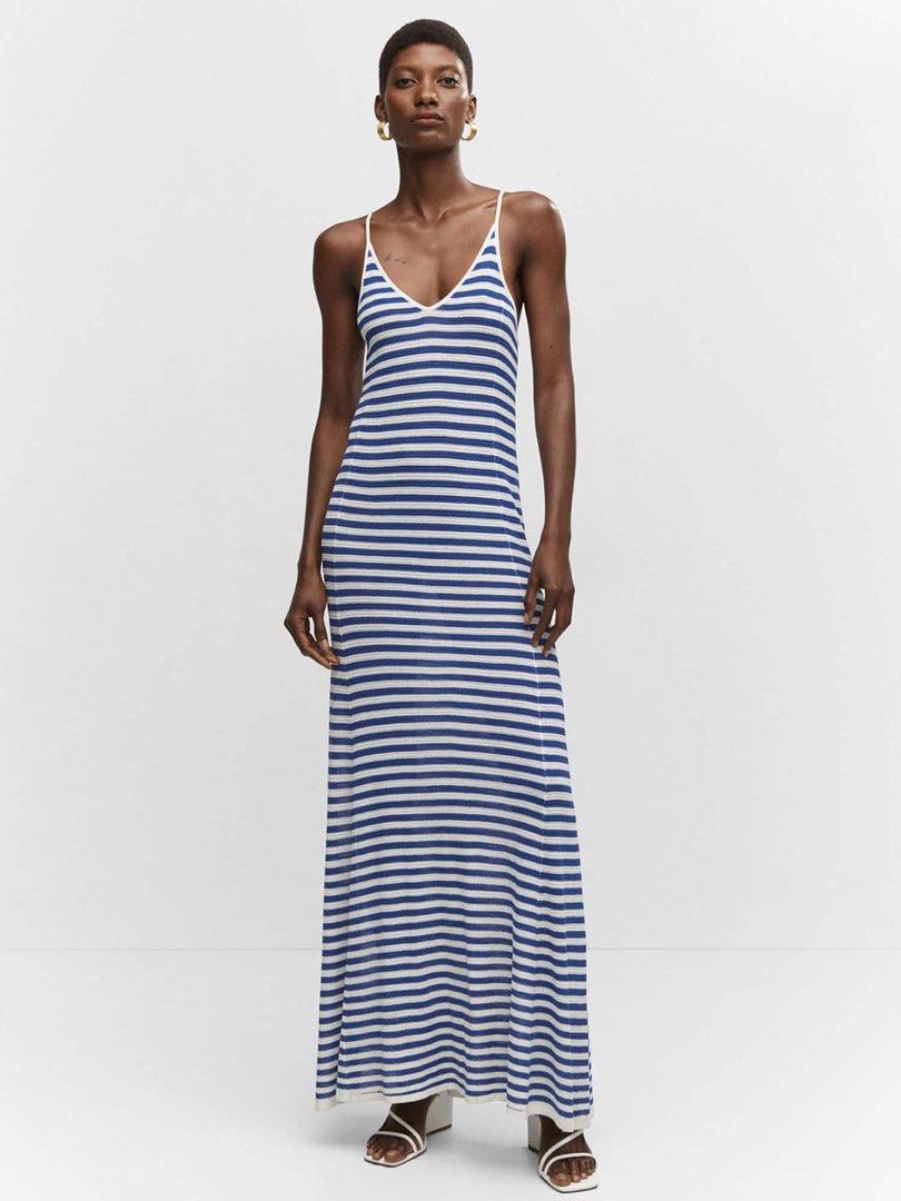 MANGO Blue and White Striped Maxi Dress (Category: Dresses) located in Manila. Submitted by kjscloset_ (Listing ID 1469339968, Image 1). Description: NO LOWBALLING ‼️ Issue: pulled threads on the bottom part of the inner dress. RFS: Decluttering Price is firm Payment first (Gcash only) Mango blue and white striped knitted maxi dress. Thin straps and racerback design. Knit material, lightweight. Size XS(Europe and USA). Has some pulled threads and