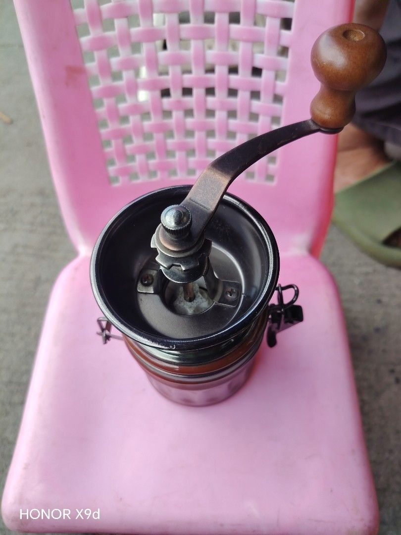 Manual Coffee Grinder with Glass Jar (Category: Coffee Machines & Makers) located in Manila. Submitted by mightypenguin_44c1b5 (Listing ID 1469209494, Image 1). Description: Hand-crank coffee grinder with adjustable settings, a durable metal mechanism, and a vintage brown glass jar. Perfect for fresh coffee at home or on camping trips..