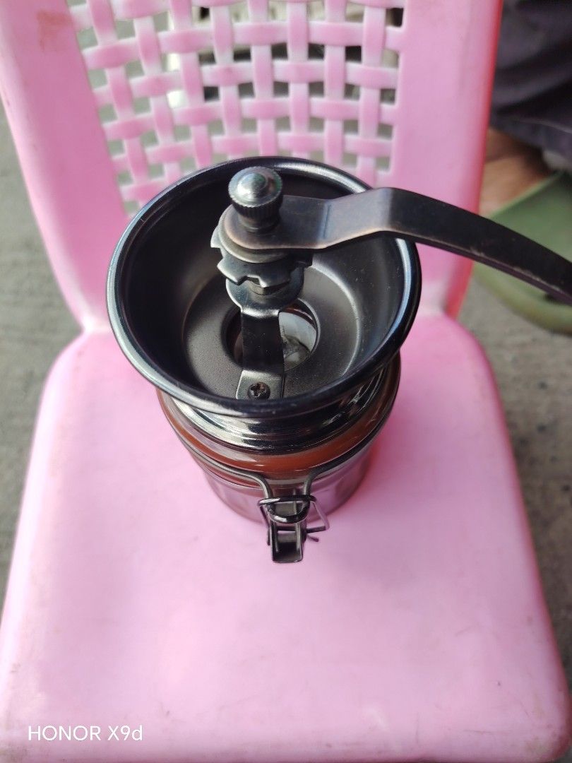 Manual Coffee Grinder with Glass Jar (Category: Coffee Machines & Makers) located in Manila. Submitted by mightypenguin_44c1b5 (Listing ID 1469209494, Image 3). Description: Hand-crank coffee grinder with adjustable settings, a durable metal mechanism, and a vintage brown glass jar. Perfect for fresh coffee at home or on camping trips..