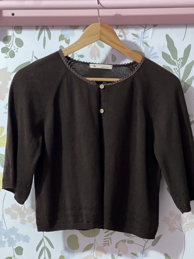 Maple Feel Brown Knit Cardigan Size L (Category: Coats, Jackets and Outerwear) located in Pasig City. Submitted by morilove (Listing ID 1469187443, Image 1). Description: - Brand/Model: Maple Feel - Size: L - Color: Brown - Material: Lightweight knit sweater - Sleeves: Half-length with textured cuffs - Details: Scalloped lace neckline trim, 2-button front closure at collar - Condition/Use: Great layering piece.