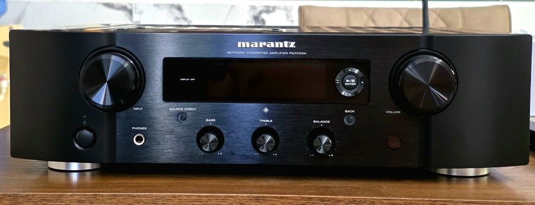 Marantz PM7000N Network Integrated Amplifier (Category: Soundbars, Speakers & Amplifiers) located in Pasig City. Submitted by odemano0318 (Listing ID 1469235337, Image 1). Description: - Model: Marantz PM7000N Integrated Network Amplifier (Black) - Condition: Clean exterior, excellent working order - Connectivity: Built-in Wi-Fi, Bluetooth, Ethernet, digital/analog inputs, and phono stage - Controls: Front panel knobs for volume, input, bass, tre